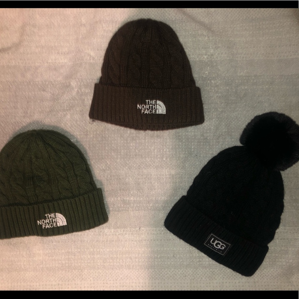 Two NorthFace and one Ugg beanie